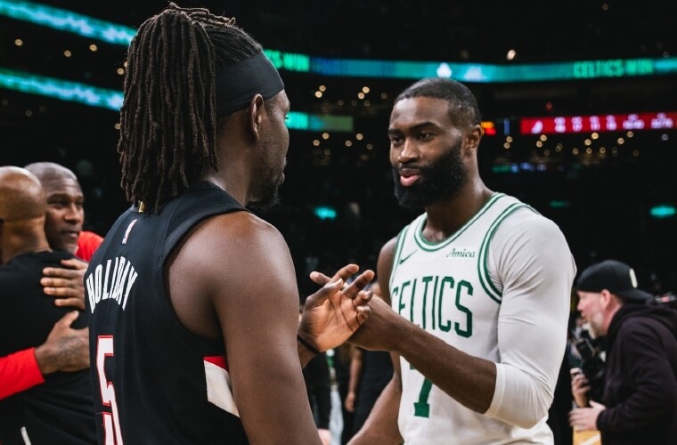 Holiday receives champion's welcome in Boston