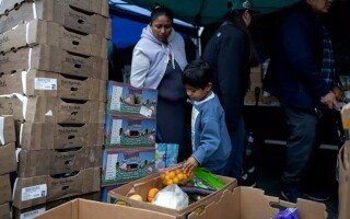 Thousands of Americans in Los Angeles line up for food as aid is cut