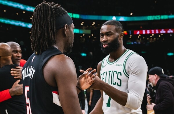 Holiday receives champion's welcome in Boston